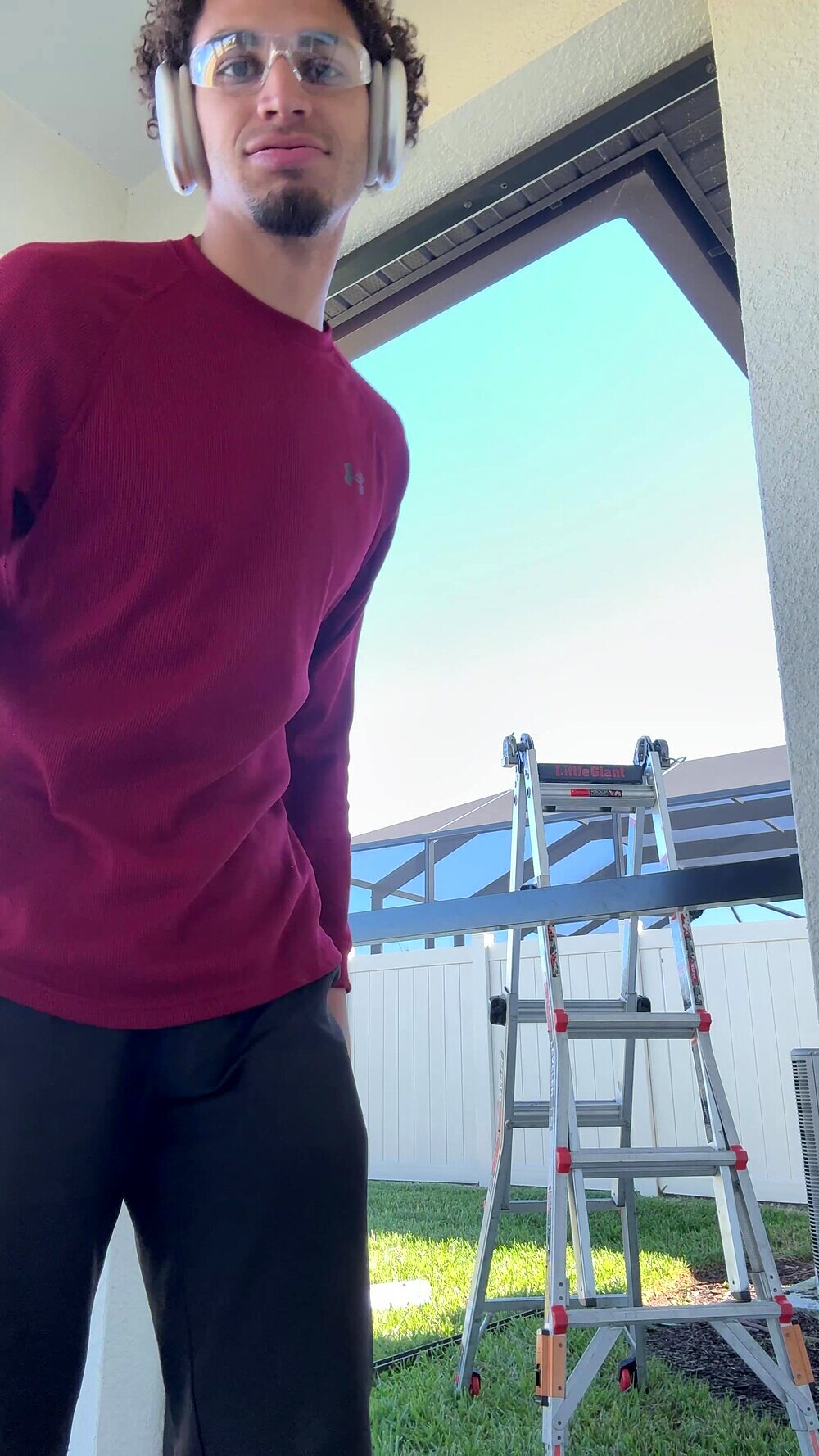 Zeke, owner of Zeke's Screens & Landscaping, on a job site