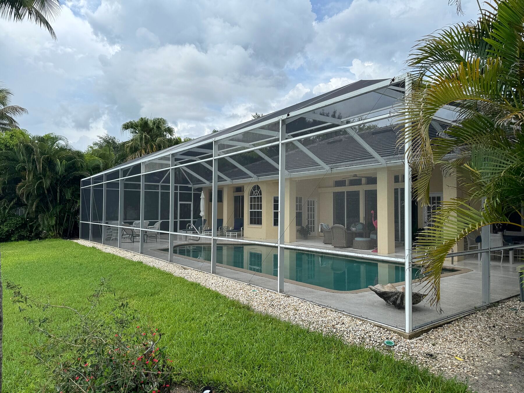 Restored pool cage screen enclosure