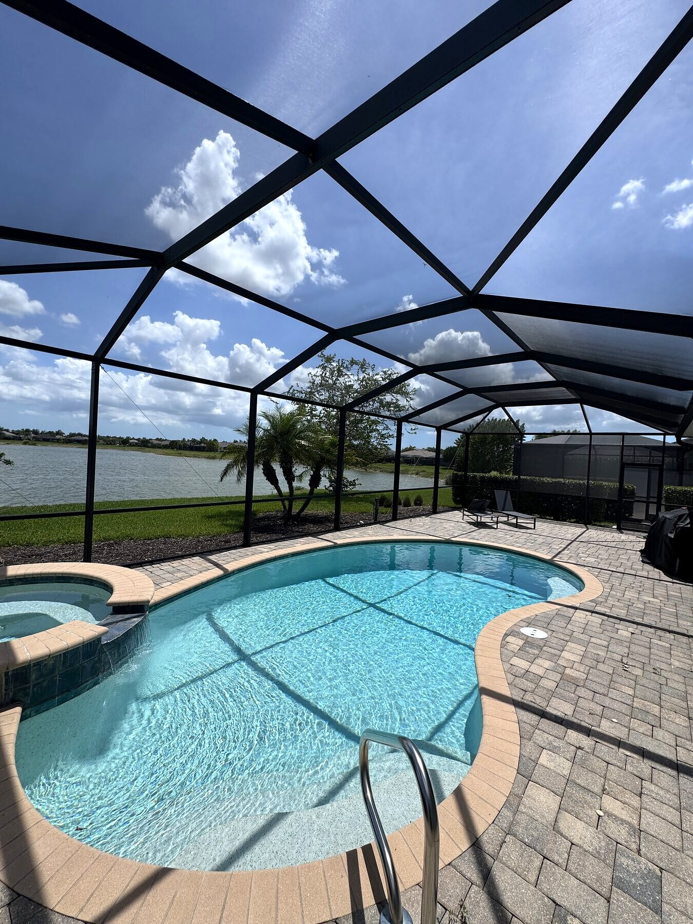 Completed pool and spa screen enclosure