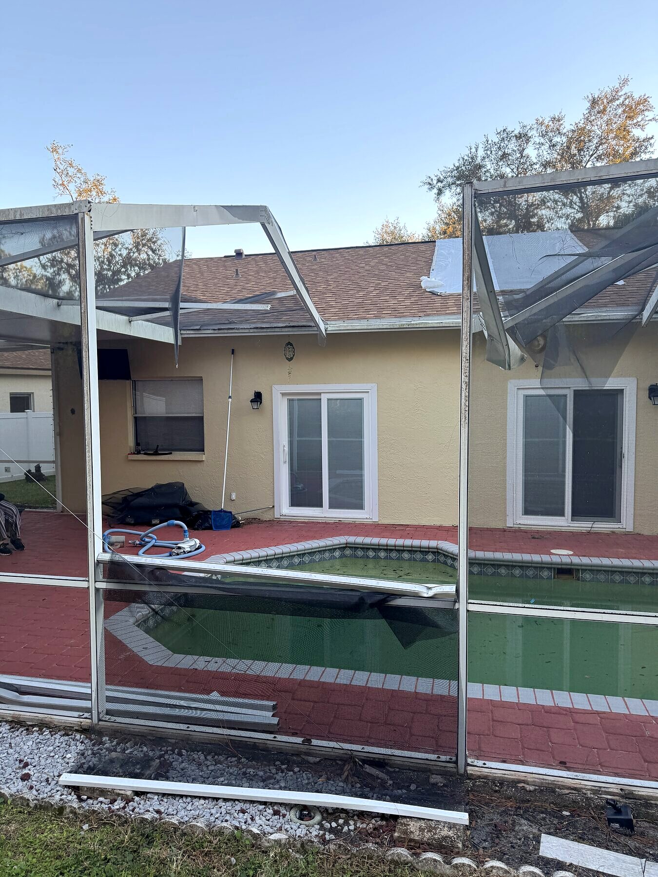 Refurbished pool cage over a pool deck